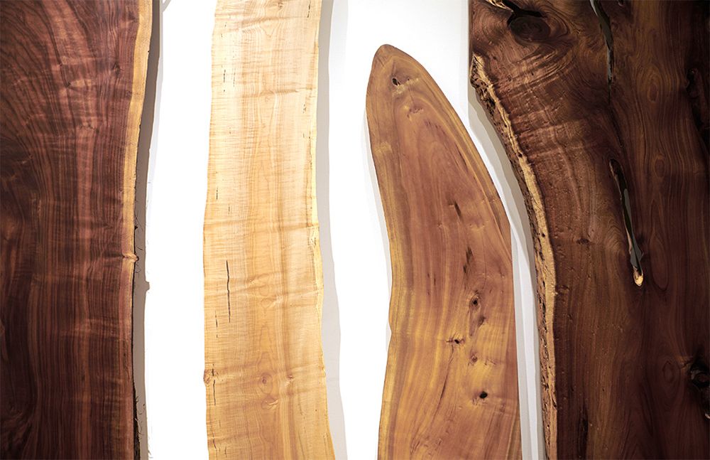 Reclaimed slabs in walnut, cypress and redwood