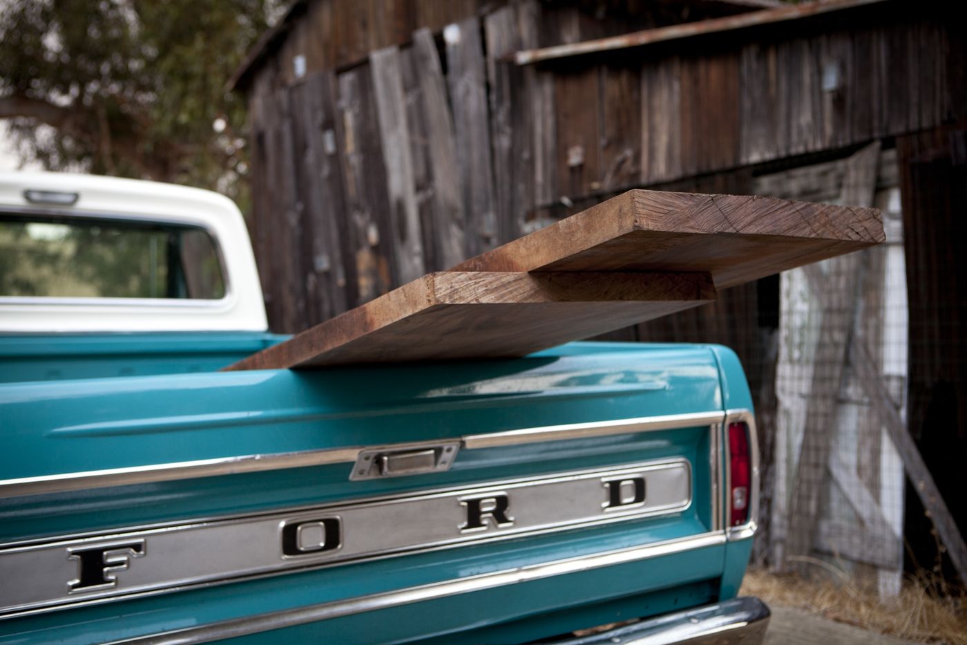 A walnut slab on the tailgate of Ol' Tug